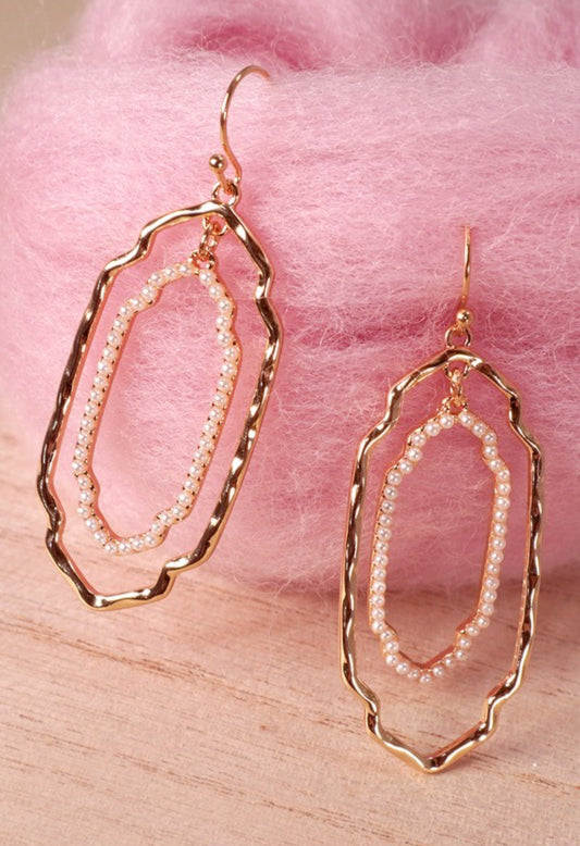 Oval shaped pearl hammered drop earrings